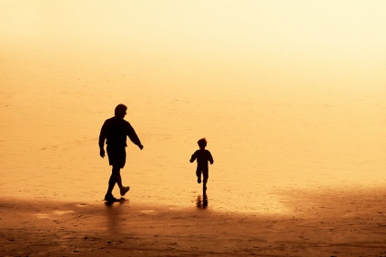 father and child on beach at sunset, Zoe Eakle, RPC, Open Sky Counselling, Victoria B.C.